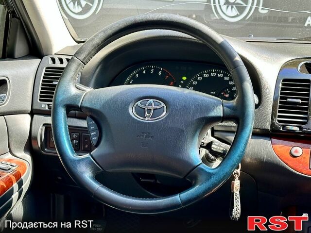 Тойота Камрі 2004 у Харкові на Automoto.ua Чорний Тойота Камрі, об'ємом двигуна 3 л та пробігом 231 тис. км за 5000 $, фото 7 на Automoto.ua