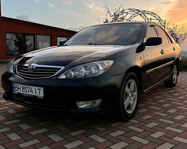 Черный Тойота Камри, объемом двигателя 3 л и пробегом 285 тыс. км за 6500 $, фото 11 на Automoto.ua