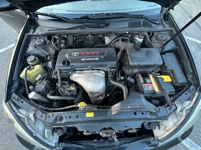 Черный Тойота Камри, объемом двигателя 2.4 л и пробегом 313 тыс. км за 5800 $, фото 20 на Automoto.ua