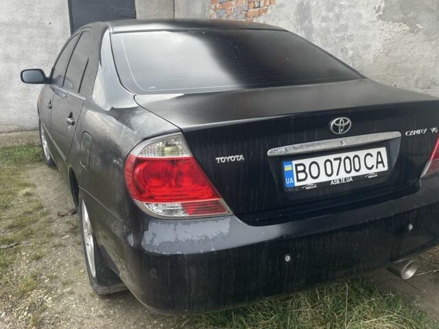 Черный Тойота Камри, объемом двигателя 3 л и пробегом 200 тыс. км за 6000 $, фото 2 на Automoto.ua