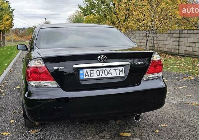 Тойота Камри 2004 в Каменское - Днепродзержинск на Automoto.ua Черный Тойота Камри, объемом двигателя 2 л и пробегом 180 тыс. км за 6700 $, фото 7 на Automoto.ua