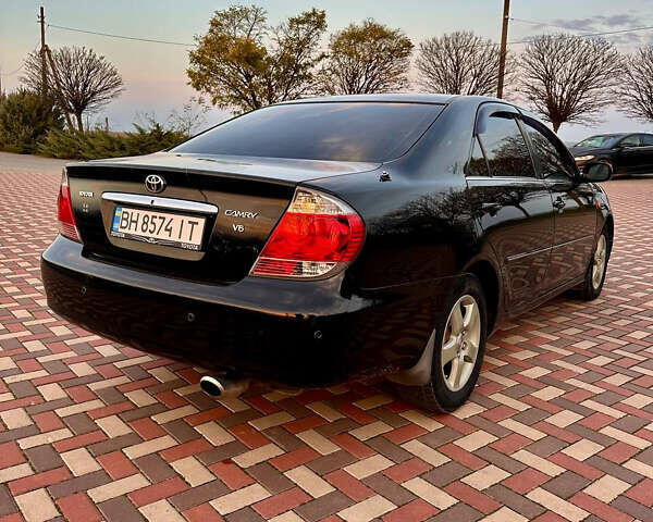 Черный Тойота Камри, объемом двигателя 3 л и пробегом 285 тыс. км за 6500 $, фото 4 на Automoto.ua