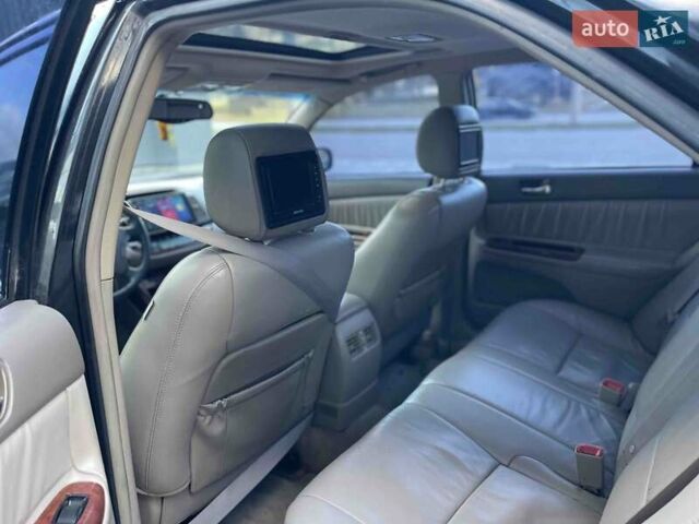 Черный Тойота Камри, объемом двигателя 3 л и пробегом 300 тыс. км за 4400 $, фото 18 на Automoto.ua