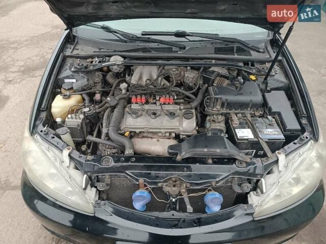 Черный Тойота Камри, объемом двигателя 3 л и пробегом 370 тыс. км за 4500 $, фото 9 на Automoto.ua