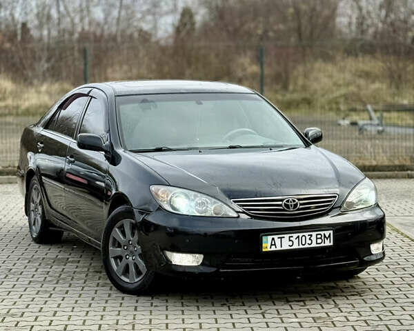 Чорний Тойота Камрі, об'ємом двигуна 3 л та пробігом 203 тис. км за 3999 $, фото 3 на Automoto.ua