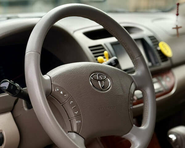 Чорний Тойота Камрі, об'ємом двигуна 3 л та пробігом 203 тис. км за 3999 $, фото 11 на Automoto.ua