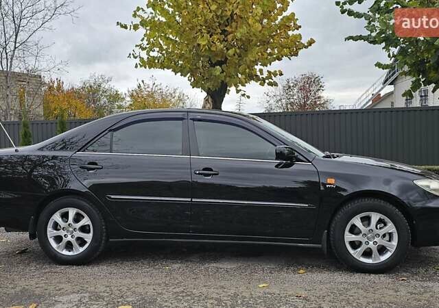 Тойота Камри 2004 в Каменское - Днепродзержинск на Automoto.ua Черный Тойота Камри, объемом двигателя 2 л и пробегом 180 тыс. км за 6700 $, фото 4 на Automoto.ua