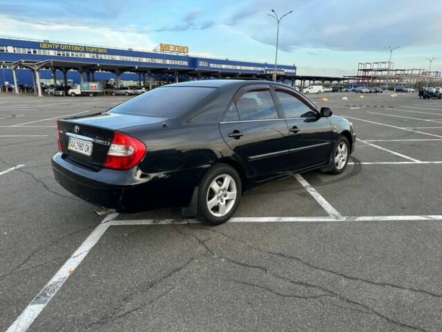 Черный Тойота Камри, объемом двигателя 2.4 л и пробегом 313 тыс. км за 5800 $, фото 3 на Automoto.ua