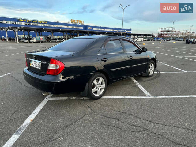 Черный Тойота Камри, объемом двигателя 2.4 л и пробегом 309 тыс. км за 6699 $, фото 3 на Automoto.ua