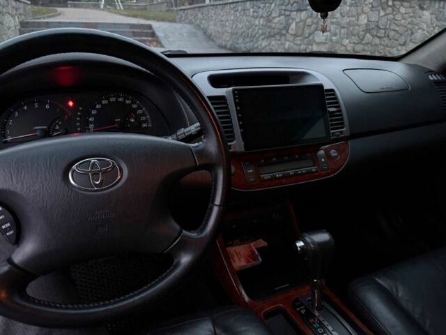Черный Тойота Камри, объемом двигателя 2.4 л и пробегом 570 тыс. км за 6199 $, фото 5 на Automoto.ua