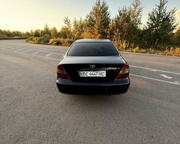 Черный Тойота Камри, объемом двигателя 3 л и пробегом 300 тыс. км за 6000 $, фото 16 на Automoto.ua