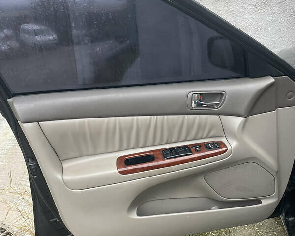 Черный Тойота Камри, объемом двигателя 3 л и пробегом 200 тыс. км за 5800 $, фото 4 на Automoto.ua