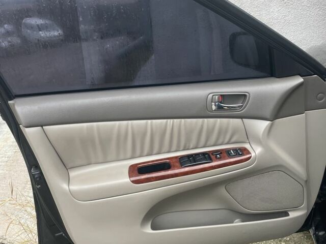 Черный Тойота Камри, объемом двигателя 3 л и пробегом 200 тыс. км за 6000 $, фото 4 на Automoto.ua