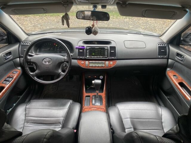 Черный Тойота Камри, объемом двигателя 2.4 л и пробегом 310 тыс. км за 5600 $, фото 6 на Automoto.ua