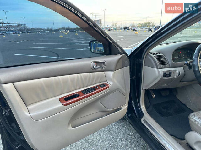 Черный Тойота Камри, объемом двигателя 2.4 л и пробегом 309 тыс. км за 6699 $, фото 11 на Automoto.ua