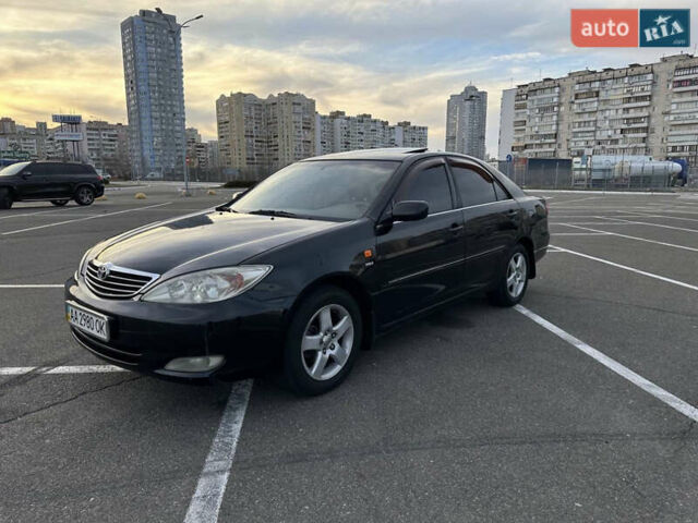 Черный Тойота Камри, объемом двигателя 2.4 л и пробегом 315 тыс. км за 5800 $, фото 6 на Automoto.ua