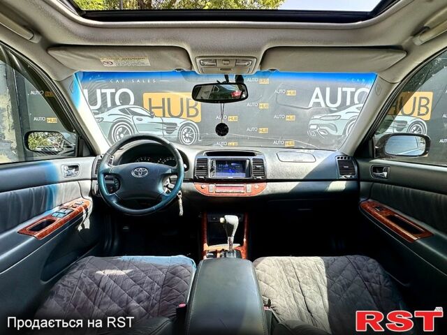 Тойота Камрі 2004 у Харкові на Automoto.ua Чорний Тойота Камрі, об'ємом двигуна 3 л та пробігом 231 тис. км за 5000 $, фото 6 на Automoto.ua