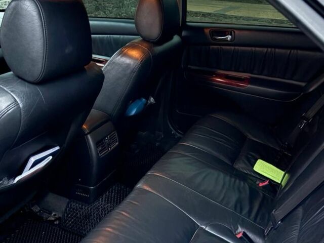 Черный Тойота Камри, объемом двигателя 2.4 л и пробегом 570 тыс. км за 6199 $, фото 7 на Automoto.ua