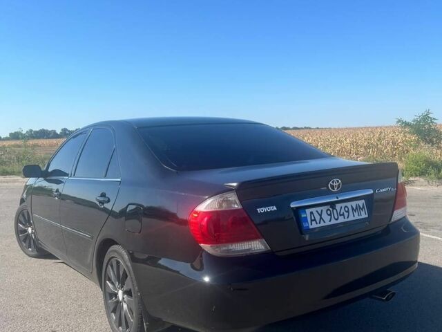 Чорний Тойота Камрі, об'ємом двигуна 2.4 л та пробігом 240 тис. км за 6200 $, фото 13 на Automoto.ua