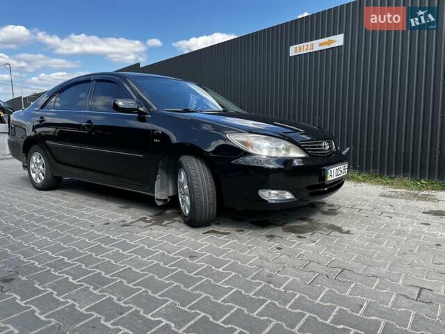 Чорний Тойота Камрі, об'ємом двигуна 2.37 л та пробігом 437 тис. км за 6400 $, фото 1 на Automoto.ua