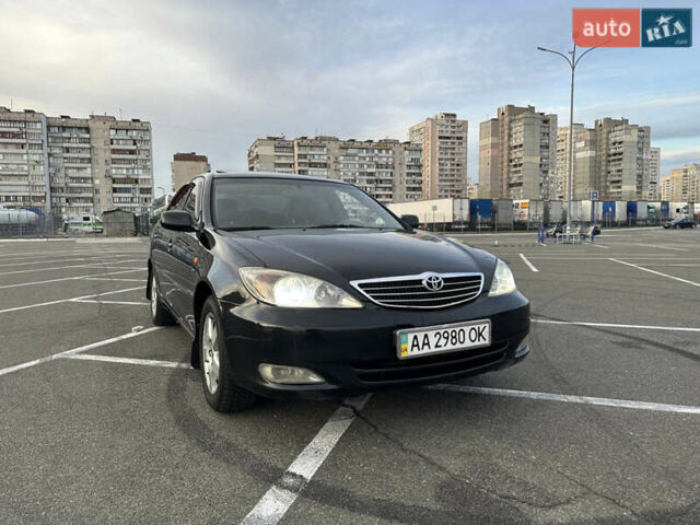 Черный Тойота Камри, объемом двигателя 2.4 л и пробегом 315 тыс. км за 5800 $, фото 3 на Automoto.ua