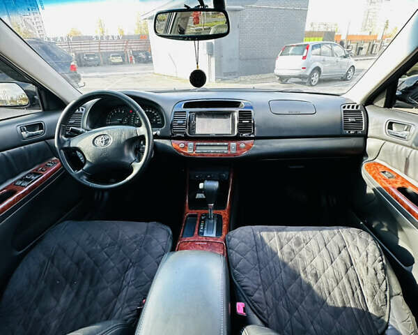 Тойота Камри 2004 в Харькове на Automoto.ua Черный Тойота Камри, объемом двигателя 3 л и пробегом 275 тыс. км за 4999 $, фото 16 на Automoto.ua