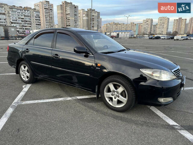 Черный Тойота Камри, объемом двигателя 2.4 л и пробегом 315 тыс. км за 5800 $, фото 2 на Automoto.ua