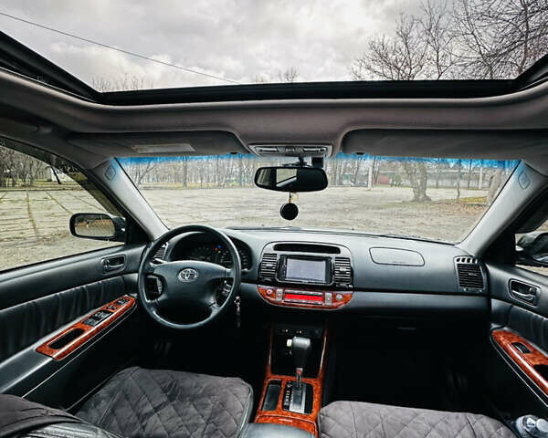 Черный Тойота Камри, объемом двигателя 3 л и пробегом 301 тыс. км за 4500 $, фото 21 на Automoto.ua