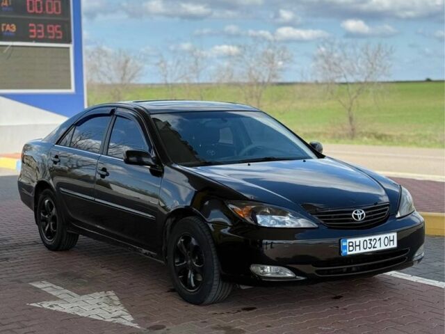 Черный Тойота Камри, объемом двигателя 3 л и пробегом 217 тыс. км за 4999 $, фото 2 на Automoto.ua