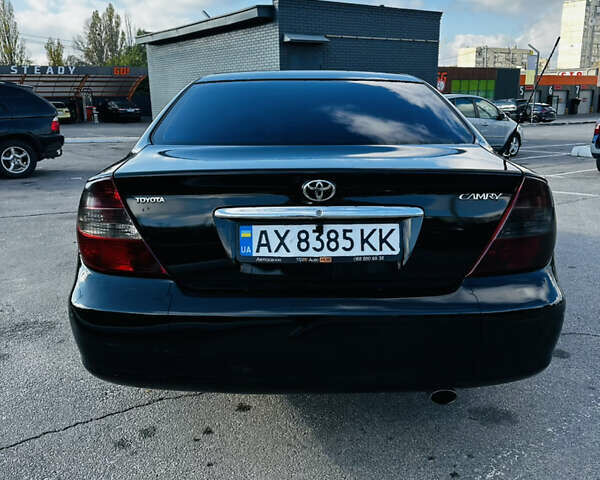 Тойота Камри 2004 в Харькове на Automoto.ua Черный Тойота Камри, объемом двигателя 3 л и пробегом 275 тыс. км за 4999 $, фото 4 на Automoto.ua
