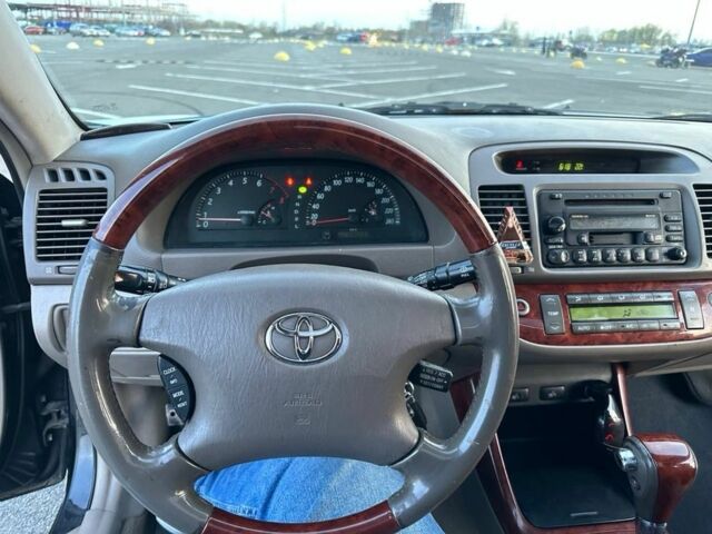 Черный Тойота Камри, объемом двигателя 2.4 л и пробегом 313 тыс. км за 5800 $, фото 10 на Automoto.ua