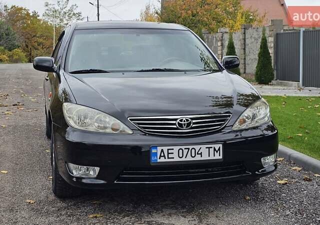 Тойота Камри 2004 в Каменское - Днепродзержинск на Automoto.ua Черный Тойота Камри, объемом двигателя 2 л и пробегом 180 тыс. км за 6700 $, фото 9 на Automoto.ua