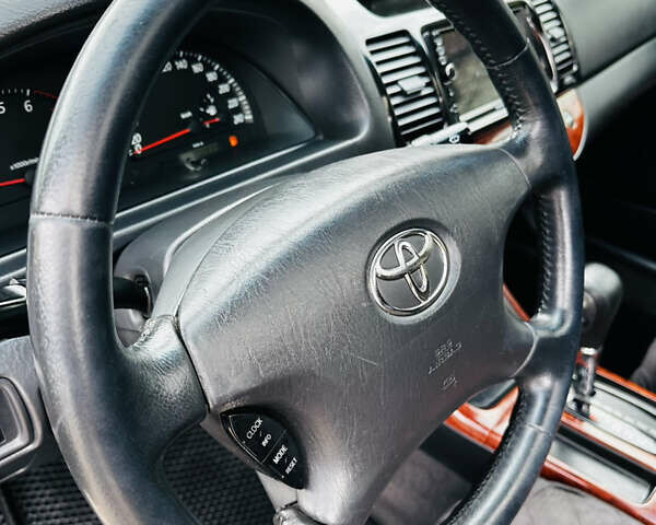 Черный Тойота Камри, объемом двигателя 3 л и пробегом 301 тыс. км за 4500 $, фото 14 на Automoto.ua