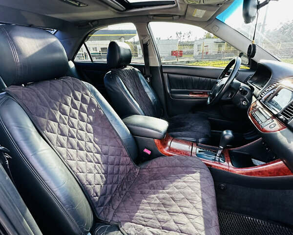 Тойота Камри 2004 в Харькове на Automoto.ua Черный Тойота Камри, объемом двигателя 3 л и пробегом 275 тыс. км за 4999 $, фото 18 на Automoto.ua