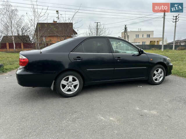 Черный Тойота Камри, объемом двигателя 2.4 л и пробегом 553 тыс. км за 5100 $, фото 3 на Automoto.ua