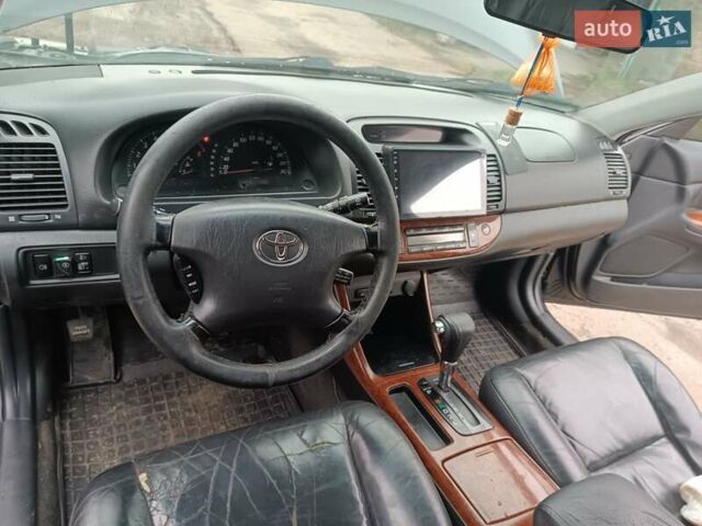 Черный Тойота Камри, объемом двигателя 3 л и пробегом 370 тыс. км за 4500 $, фото 17 на Automoto.ua