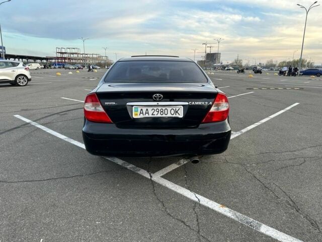 Черный Тойота Камри, объемом двигателя 2.4 л и пробегом 313 тыс. км за 5800 $, фото 4 на Automoto.ua