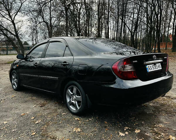Черный Тойота Камри, объемом двигателя 3 л и пробегом 301 тыс. км за 4500 $, фото 6 на Automoto.ua