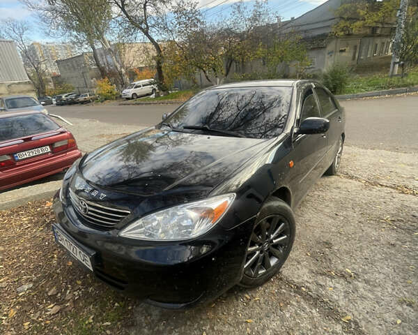 Черный Тойота Камри, объемом двигателя 3 л и пробегом 340 тыс. км за 6700 $, фото 13 на Automoto.ua