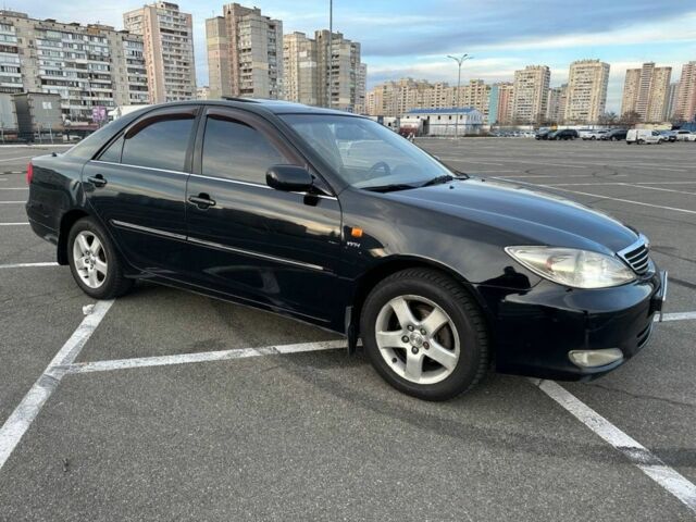 Черный Тойота Камри, объемом двигателя 2.4 л и пробегом 313 тыс. км за 5800 $, фото 2 на Automoto.ua