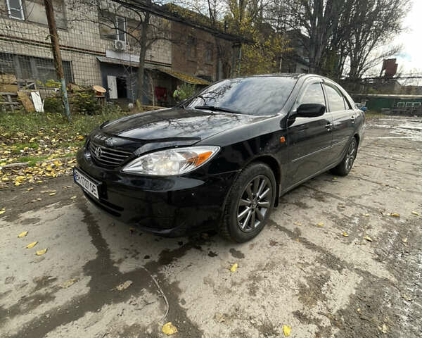 Черный Тойота Камри, объемом двигателя 3 л и пробегом 340 тыс. км за 6700 $, фото 14 на Automoto.ua