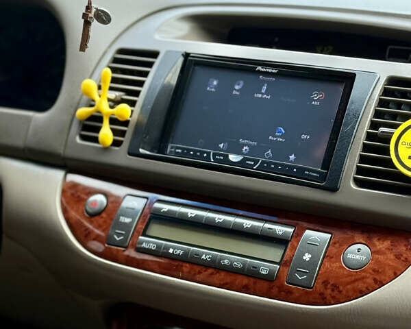 Чорний Тойота Камрі, об'ємом двигуна 3 л та пробігом 203 тис. км за 3999 $, фото 18 на Automoto.ua