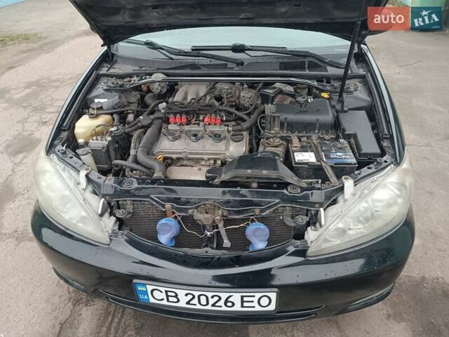 Черный Тойота Камри, объемом двигателя 3 л и пробегом 370 тыс. км за 4500 $, фото 8 на Automoto.ua