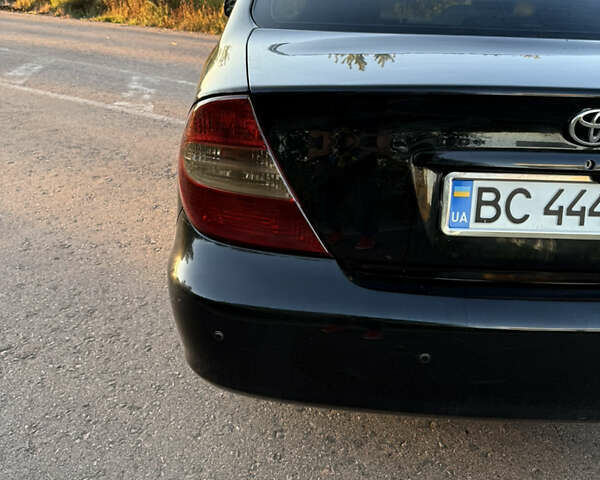 Черный Тойота Камри, объемом двигателя 3 л и пробегом 300 тыс. км за 6000 $, фото 9 на Automoto.ua
