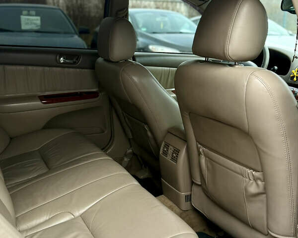 Чорний Тойота Камрі, об'ємом двигуна 3 л та пробігом 203 тис. км за 3999 $, фото 20 на Automoto.ua