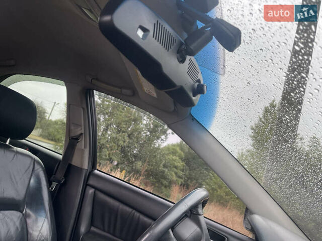 Черный Тойота Камри, объемом двигателя 3 л и пробегом 340 тыс. км за 6700 $, фото 5 на Automoto.ua