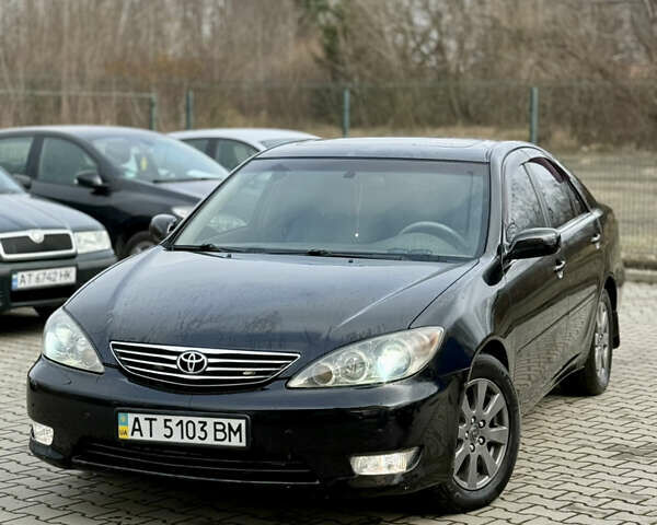 Чорний Тойота Камрі, об'ємом двигуна 3 л та пробігом 203 тис. км за 3999 $, фото 1 на Automoto.ua
