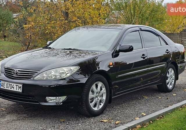 Тойота Камри 2004 в Каменское - Днепродзержинск на Automoto.ua Черный Тойота Камри, объемом двигателя 2 л и пробегом 180 тыс. км за 6700 $, фото 11 на Automoto.ua