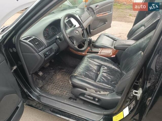 Черный Тойота Камри, объемом двигателя 3 л и пробегом 370 тыс. км за 4500 $, фото 15 на Automoto.ua