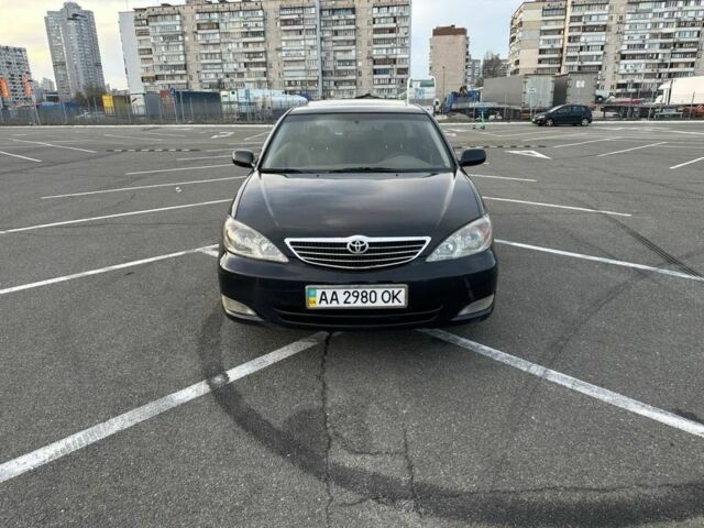 Черный Тойота Камри, объемом двигателя 2.4 л и пробегом 313 тыс. км за 5800 $, фото 7 на Automoto.ua